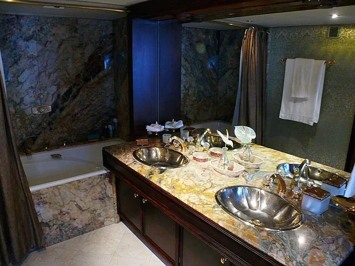 a bathroom with a marble countertop aboard C SIDE Yacht for Sale