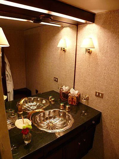 a table with a glass bowl and a plate with food on it aboard C SIDE Yacht for Sale