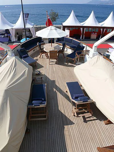 a deck with tents and chairs aboard C SIDE Yacht for Sale