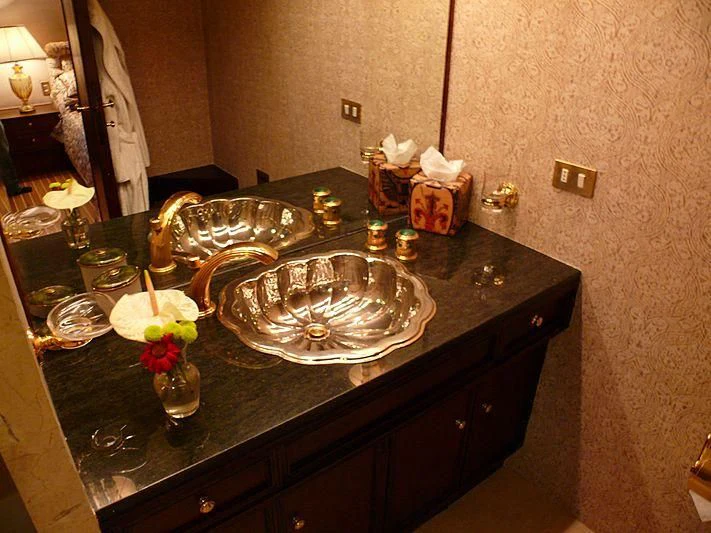 a fancy dinner table aboard C SIDE Yacht for Sale