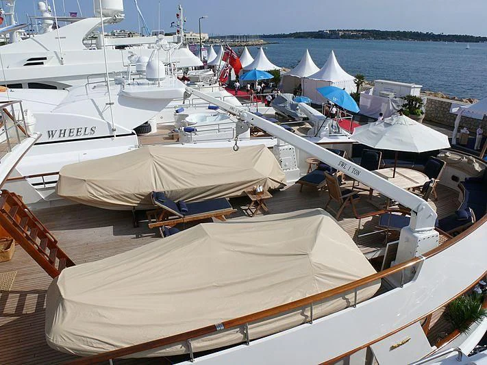 a group of boats are parked on the side of a dock aboard C SIDE Yacht for Sale