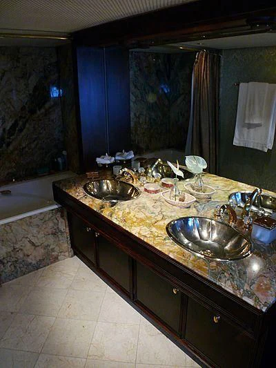 a bathroom with a sink and a mirror aboard C SIDE Yacht for Sale