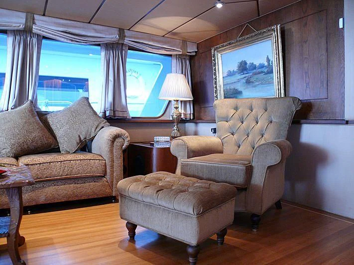 a living room with a large window aboard C SIDE Yacht for Sale