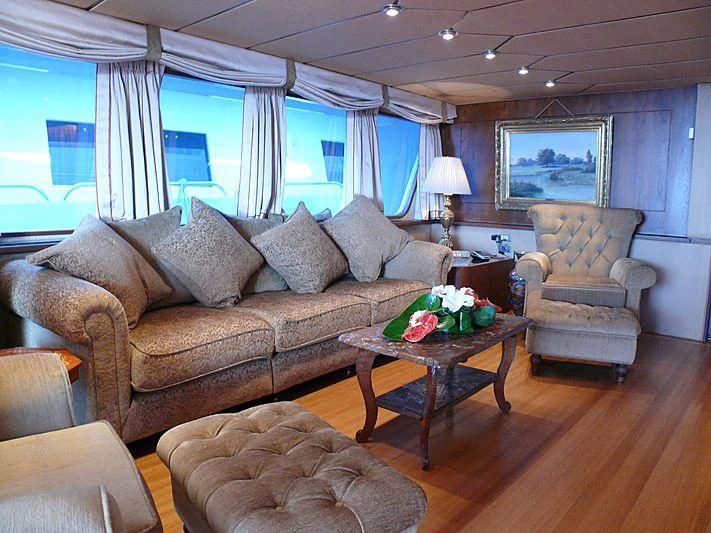 a living room with a large window aboard C SIDE Yacht for Sale