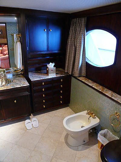 a bathroom with a sink and a mirror aboard C SIDE Yacht for Sale