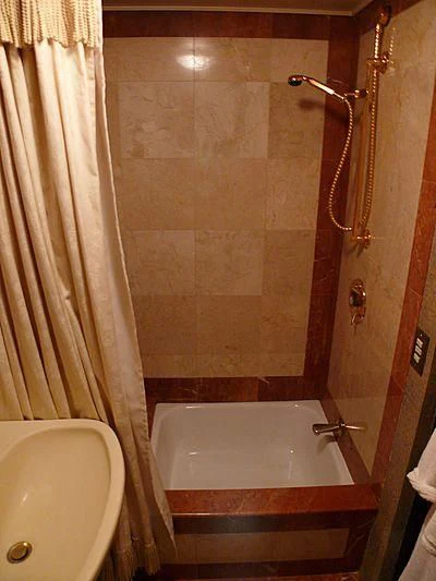 a bathtub in a bathroom aboard C SIDE Yacht for Sale