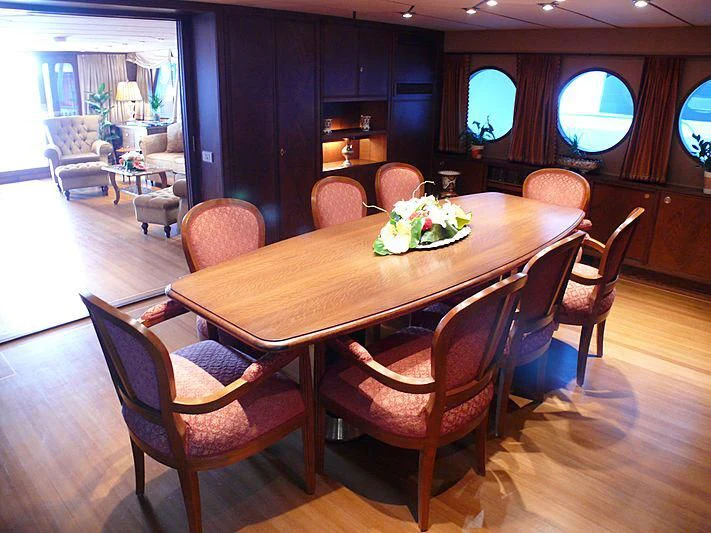 a dining table in a restaurant aboard C SIDE Yacht for Sale