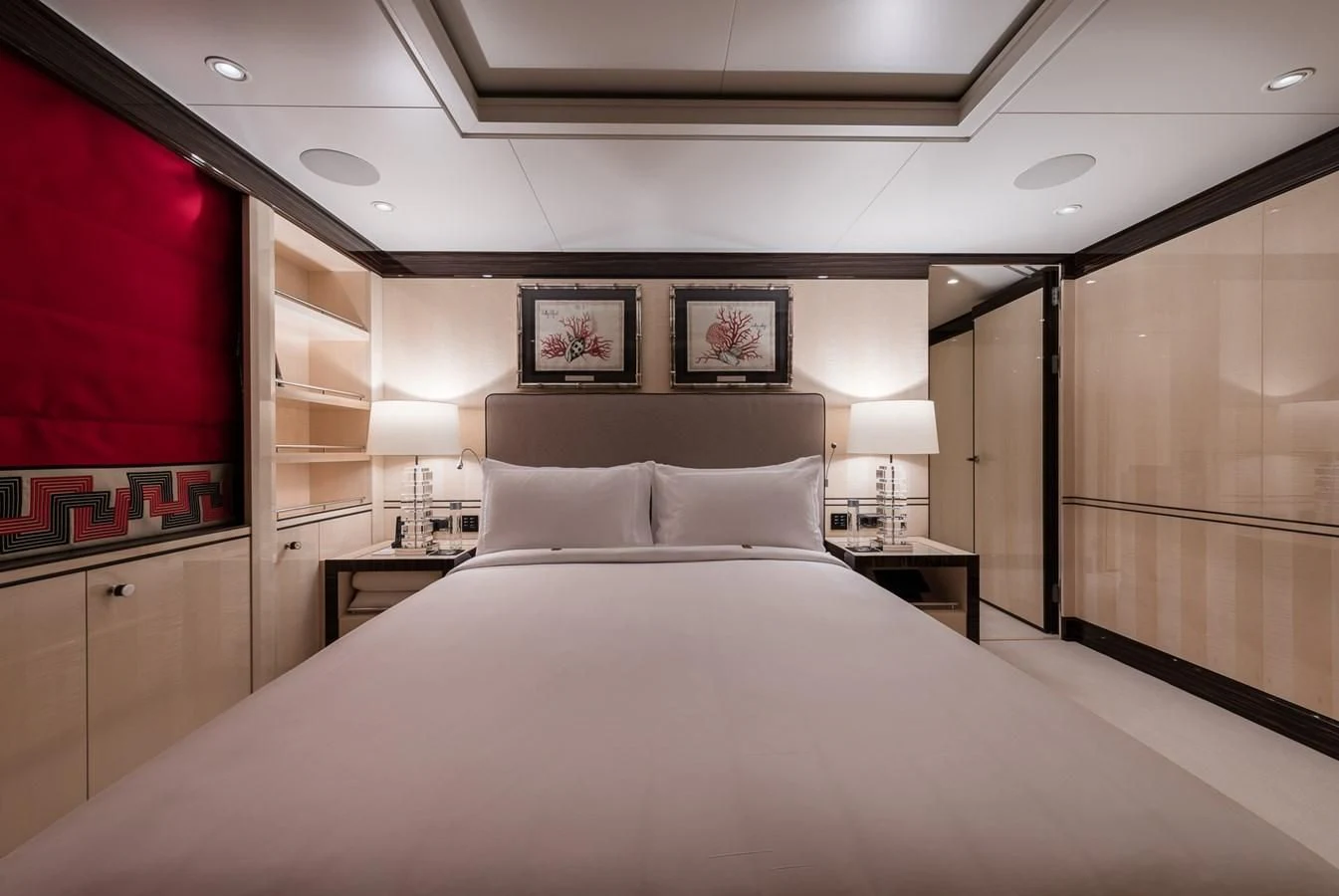 a large bed in a room aboard AMIGOS Yacht for Charter