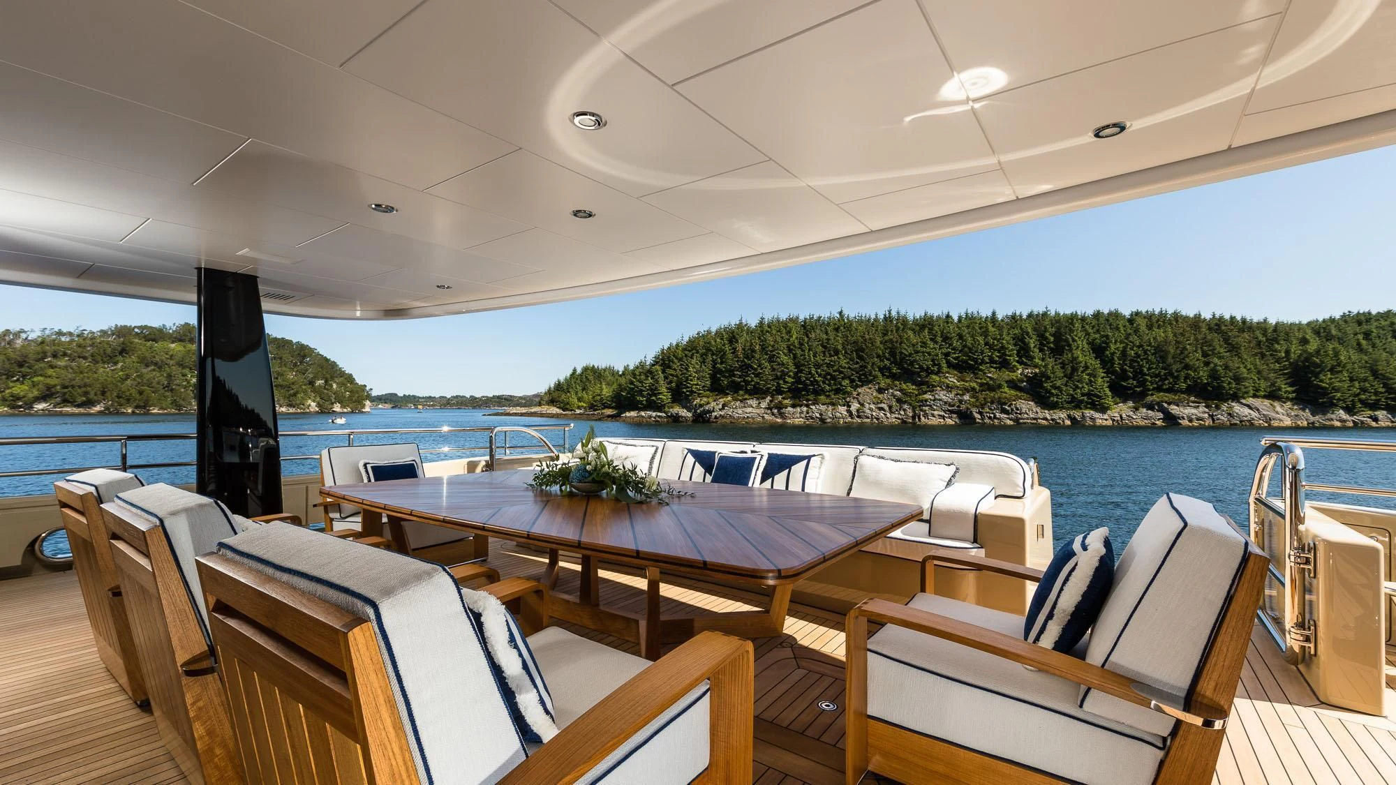 a large table on a boat aboard AMIGOS Yacht for Charter