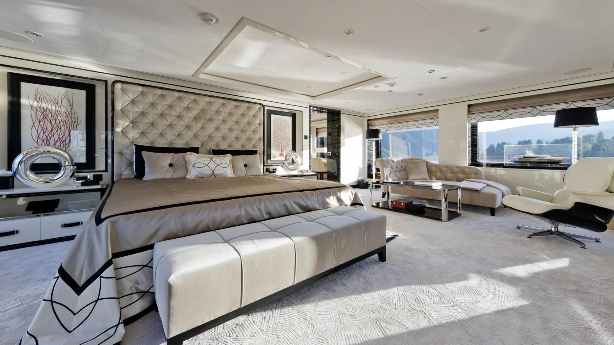 a large bedroom with a large bed aboard AMIGOS Yacht for Charter