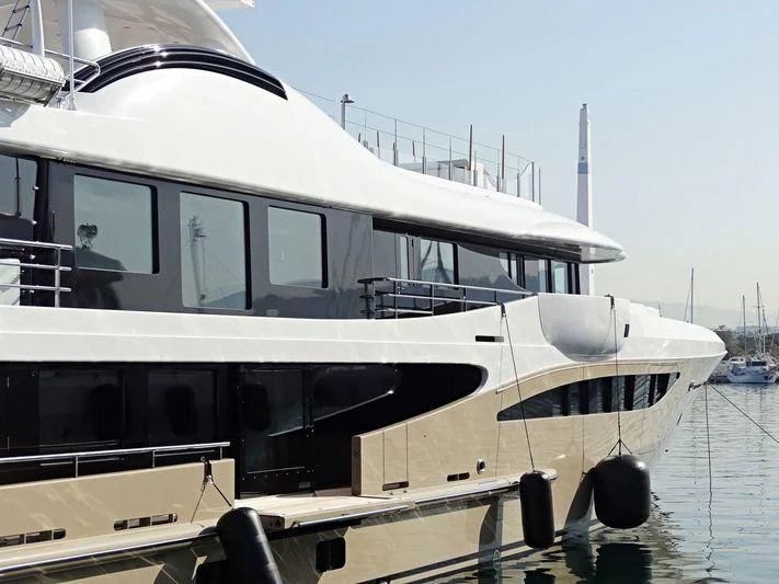 a boat docked at a pier aboard AMIGOS Yacht for Charter