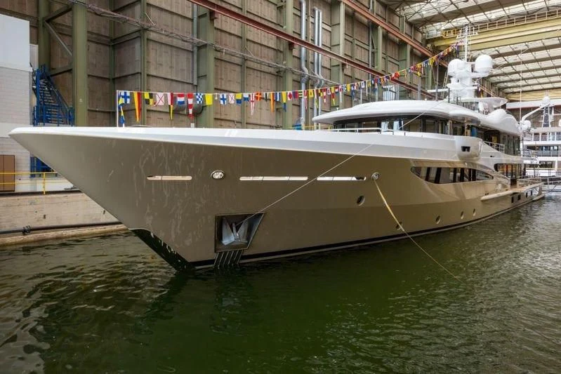 a boat docked in a harbor aboard AMIGOS Yacht for Charter