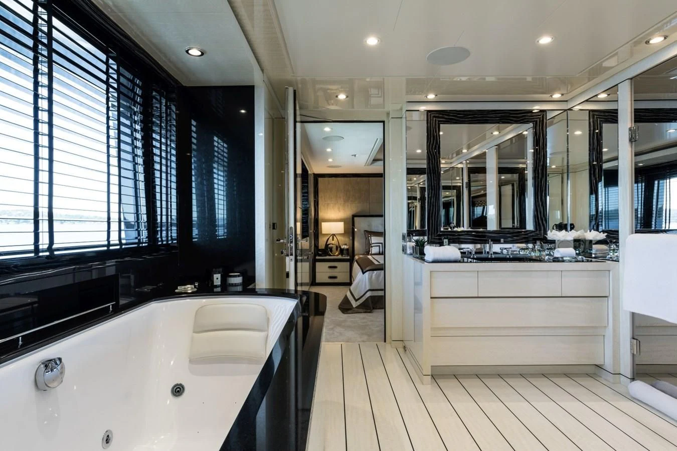 a large kitchen with a large window aboard AMIGOS Yacht for Charter