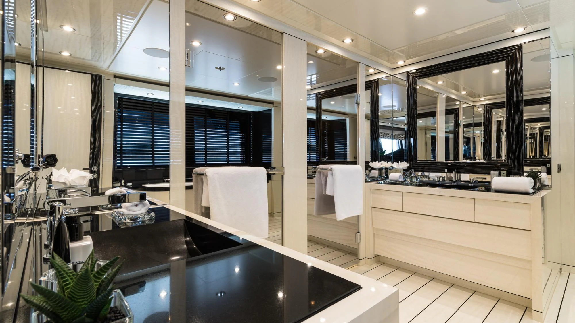 a bathroom with a large countertop aboard AMIGOS Yacht for Charter