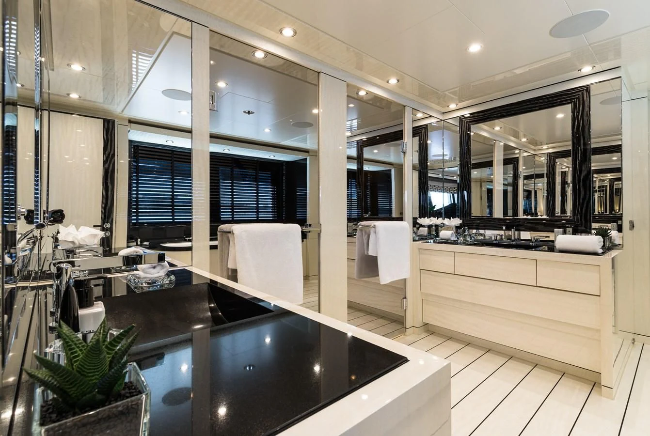 a bathroom with a large sink aboard AMIGOS Yacht for Charter