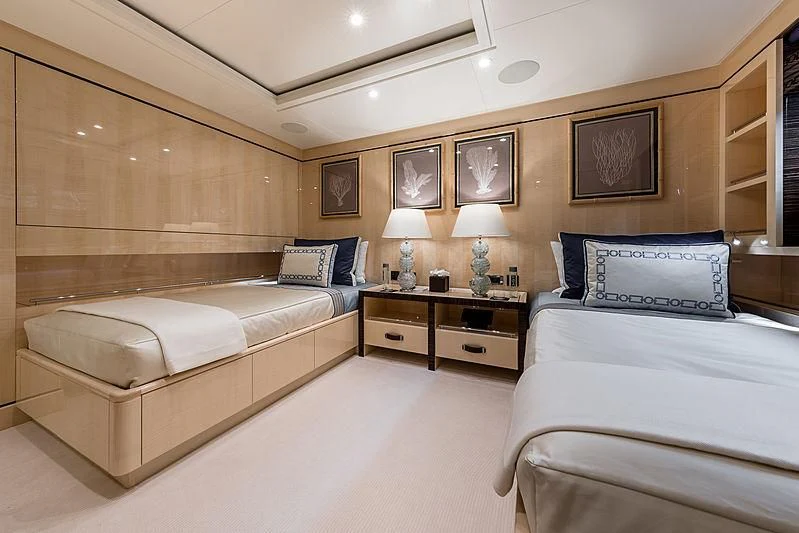 a room with two beds aboard AMIGOS Yacht for Charter