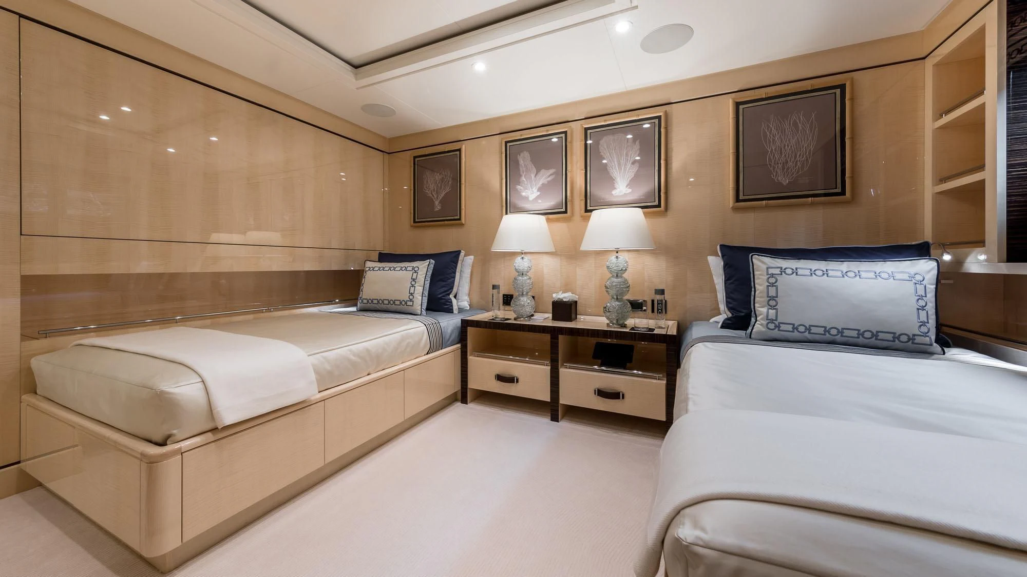 a room with a bed and a desk aboard AMIGOS Yacht for Charter