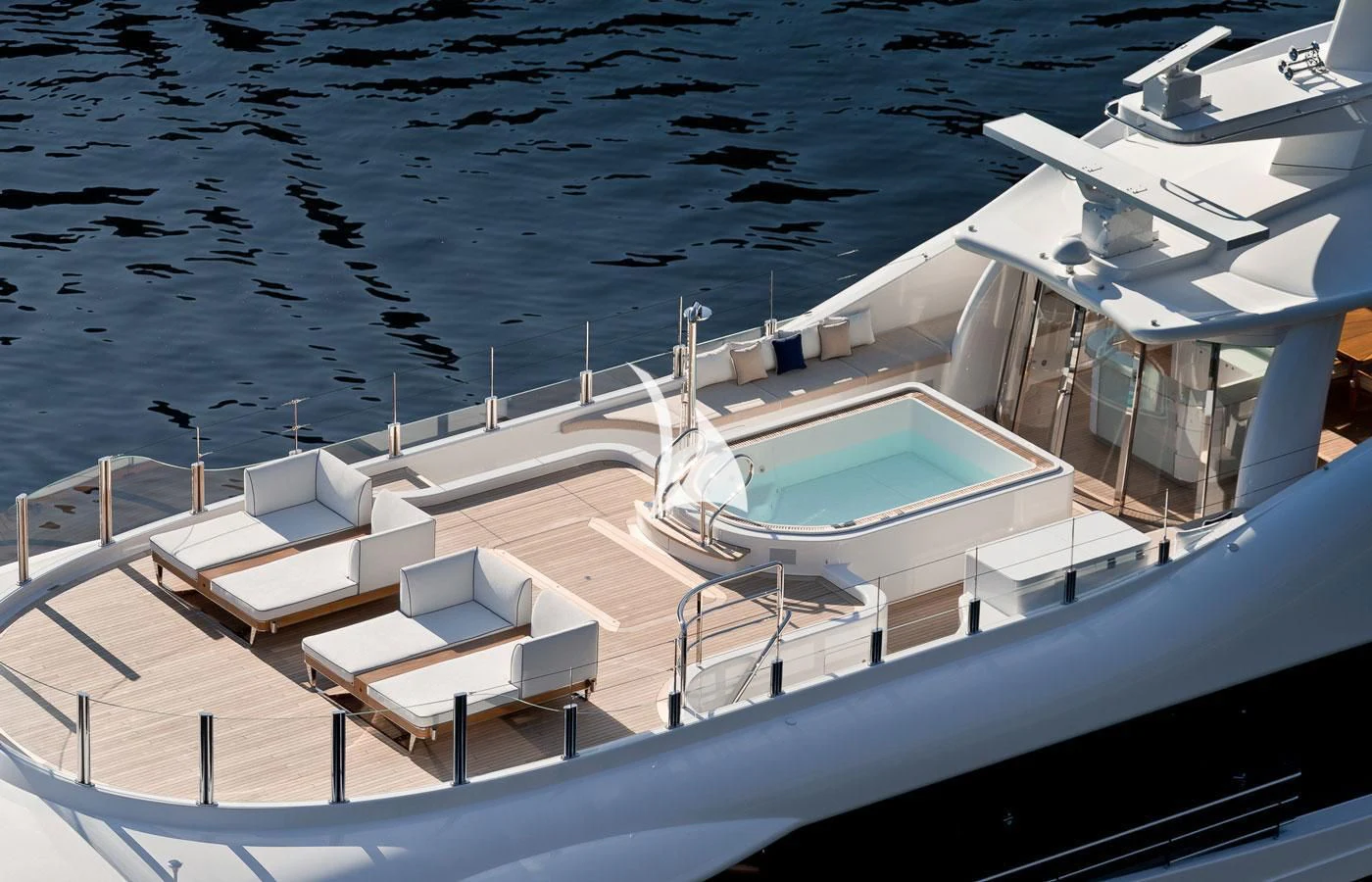 a large ship in the water aboard AMIGOS Yacht for Charter