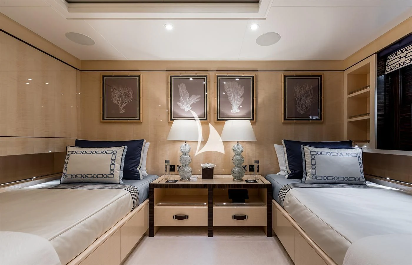 a room with two beds aboard AMIGOS Yacht for Charter