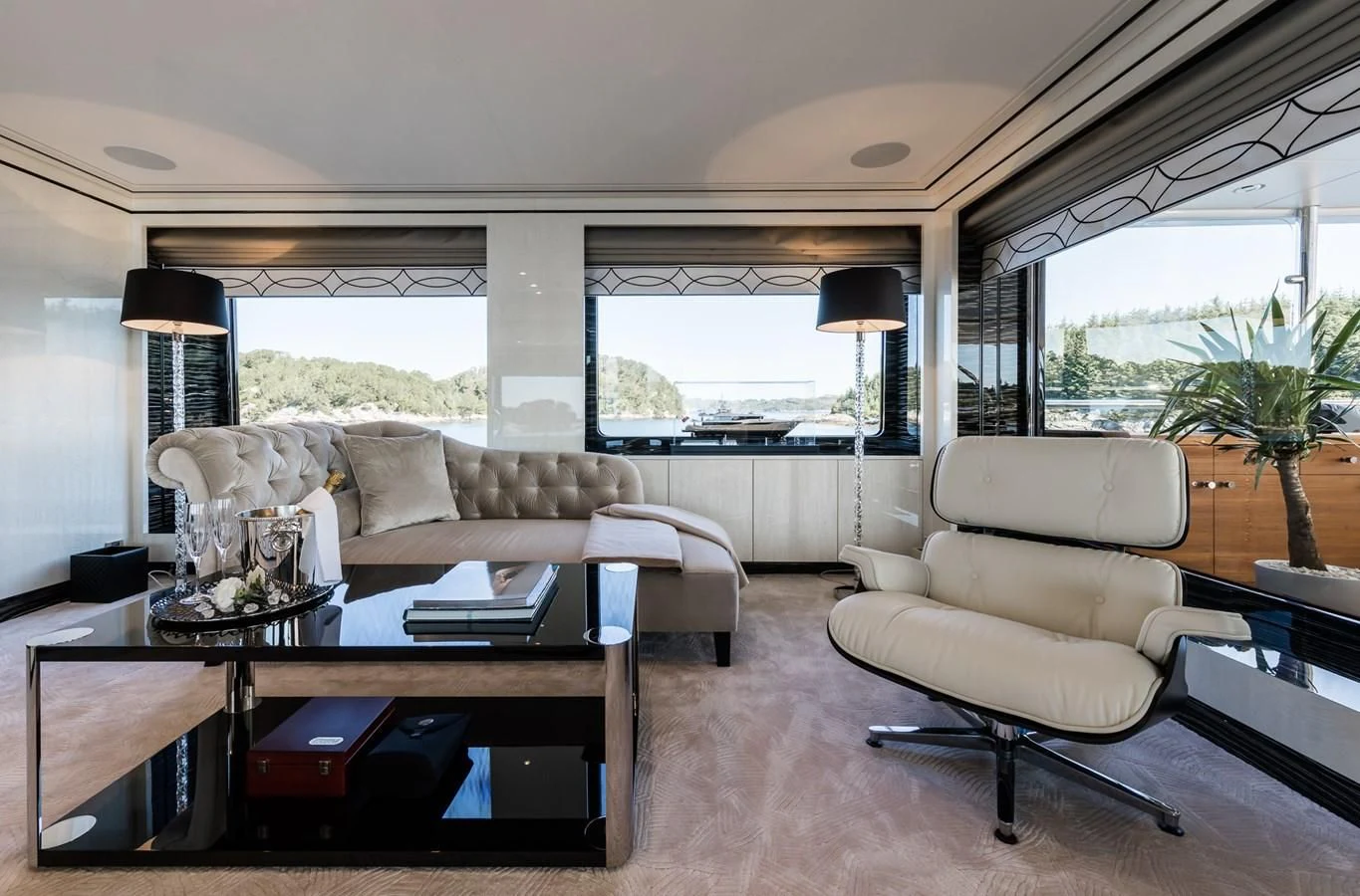 a living room with a couch and a coffee table aboard AMIGOS Yacht for Charter