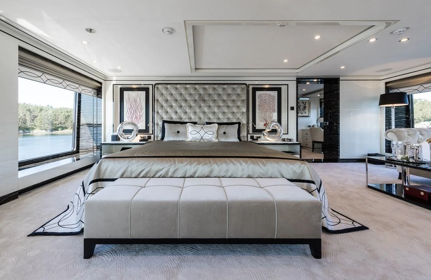 a large bed in a room aboard AMIGOS Yacht for Charter