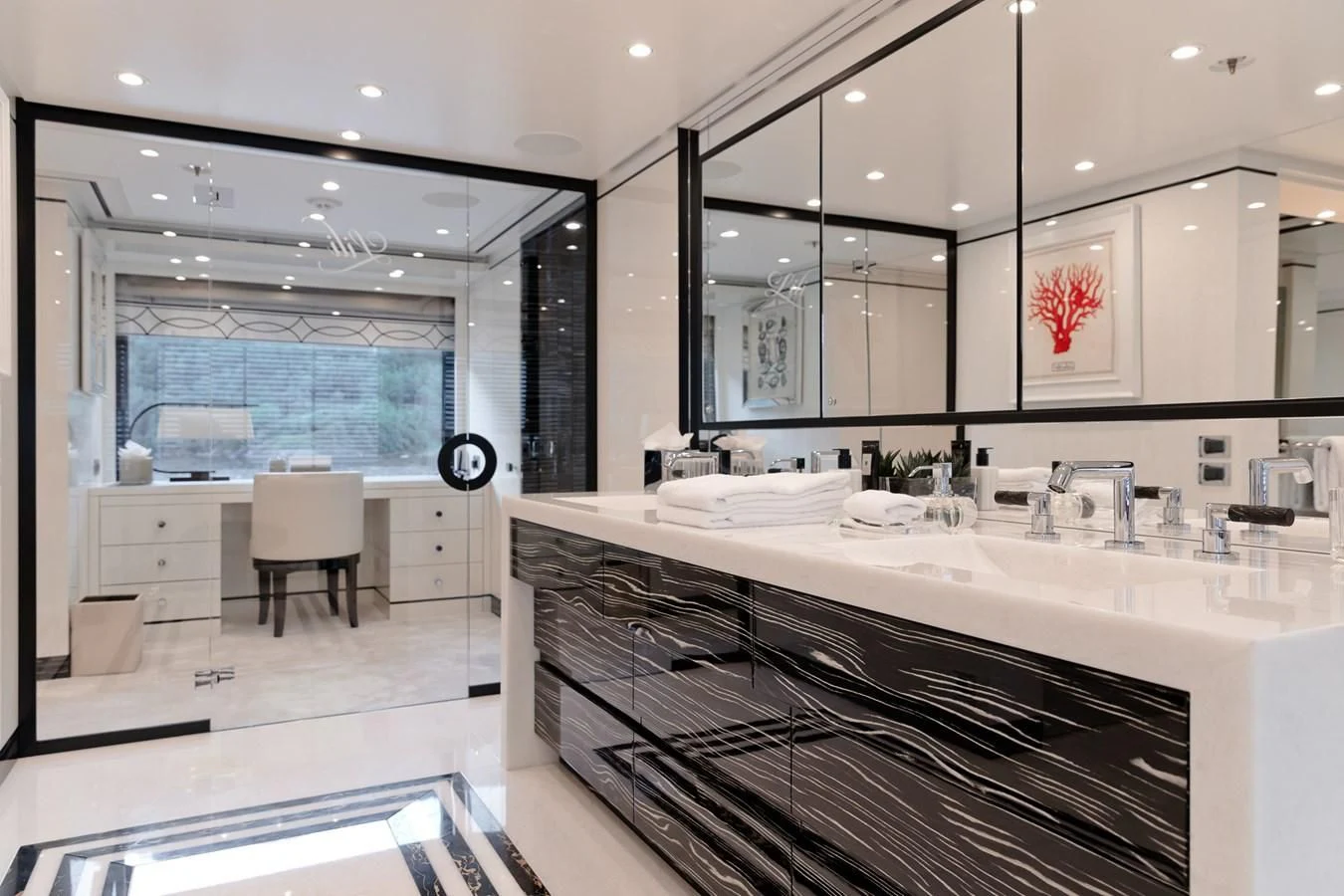 a large bathroom with a large window aboard AMIGOS Yacht for Charter