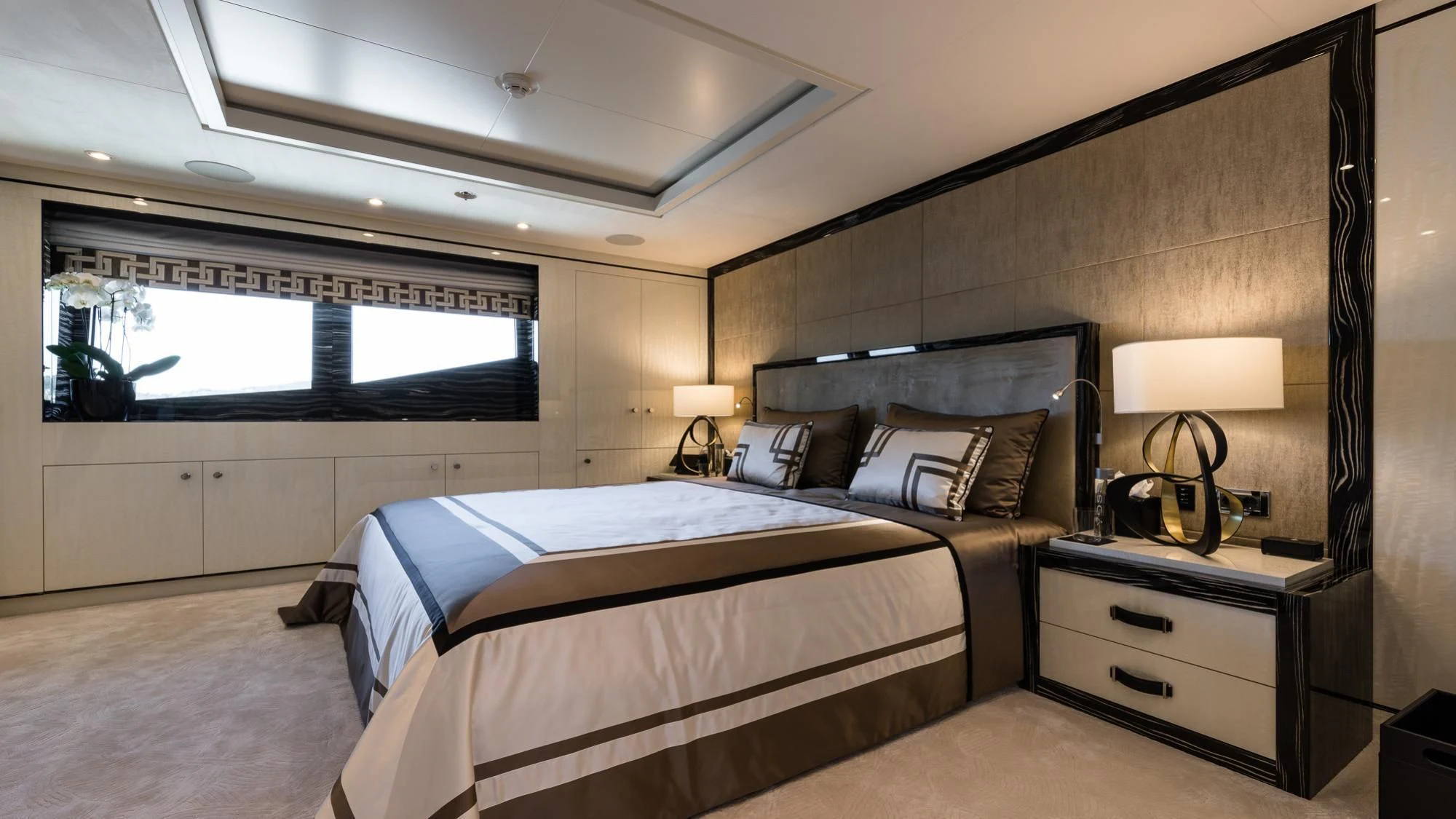 a room with two beds aboard AMIGOS Yacht for Charter