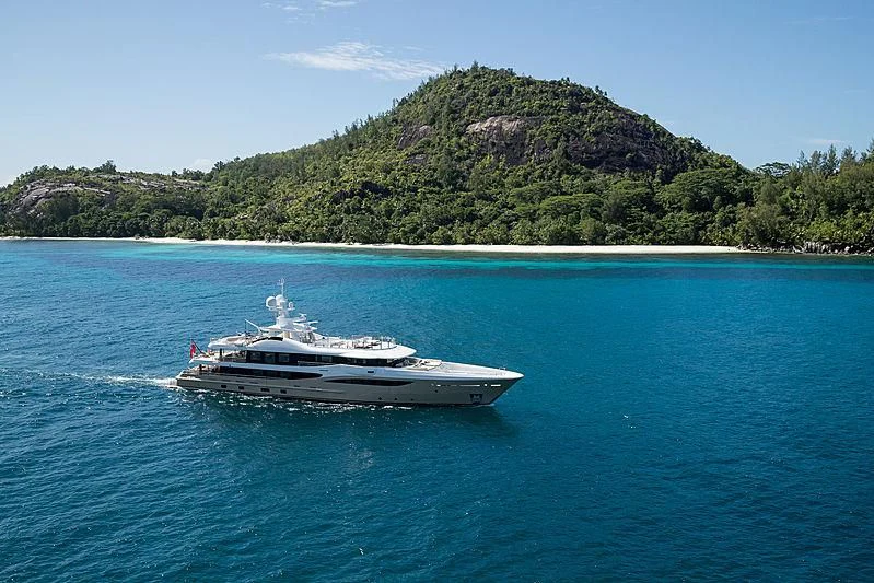 a boat sailing on the water aboard AMIGOS Yacht for Charter