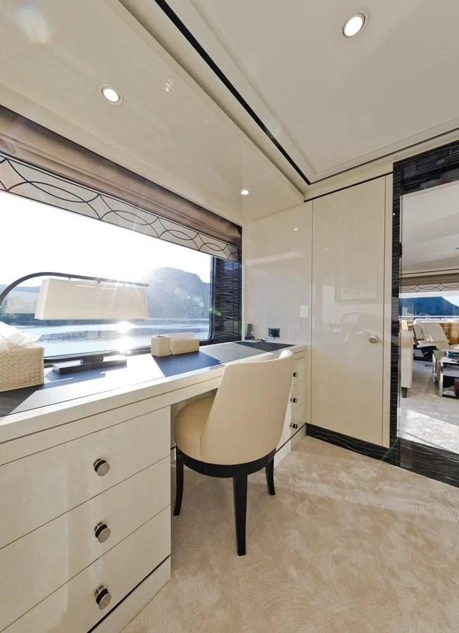 a kitchen with a large window aboard AMIGOS Yacht for Charter