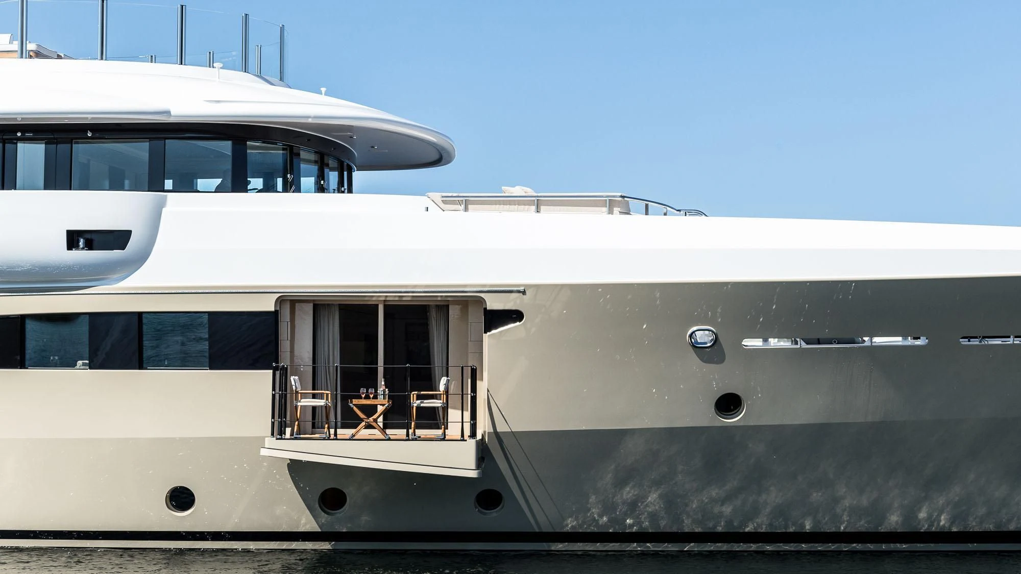 a white boat with a deck aboard AMIGOS Yacht for Charter