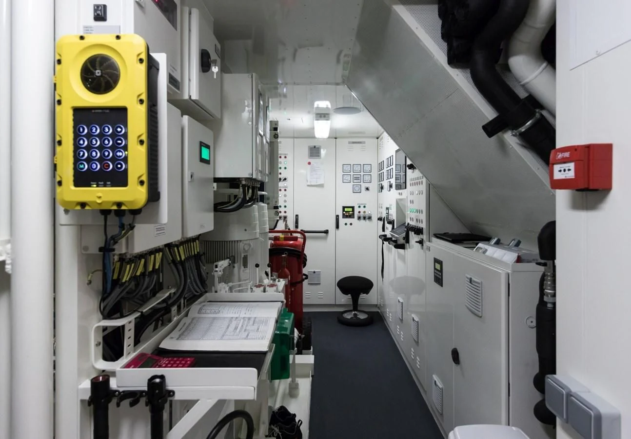 a machine in a factory aboard AMIGOS Yacht for Charter