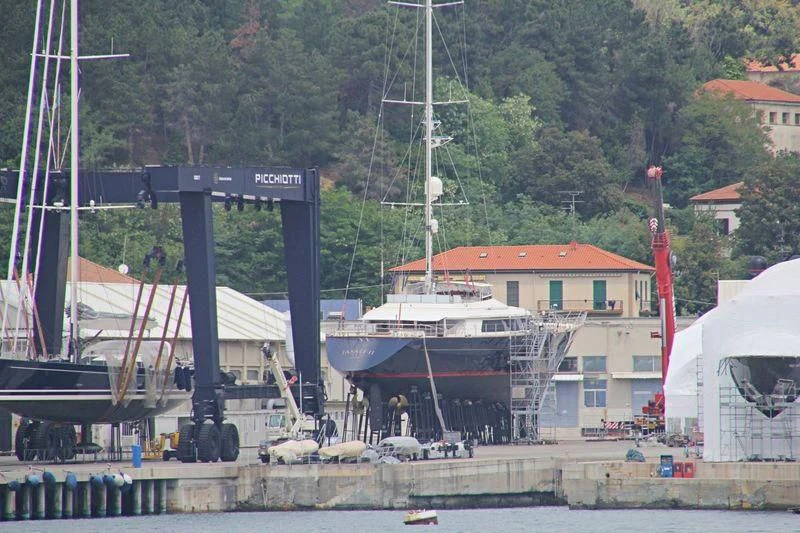 a boat docked at a pier aboard JASALI II Yacht for Charter