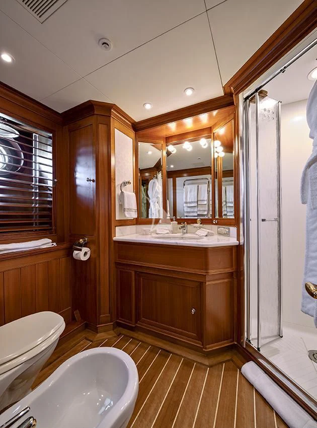a bathroom with a shower and sink aboard JASALI II Yacht for Charter