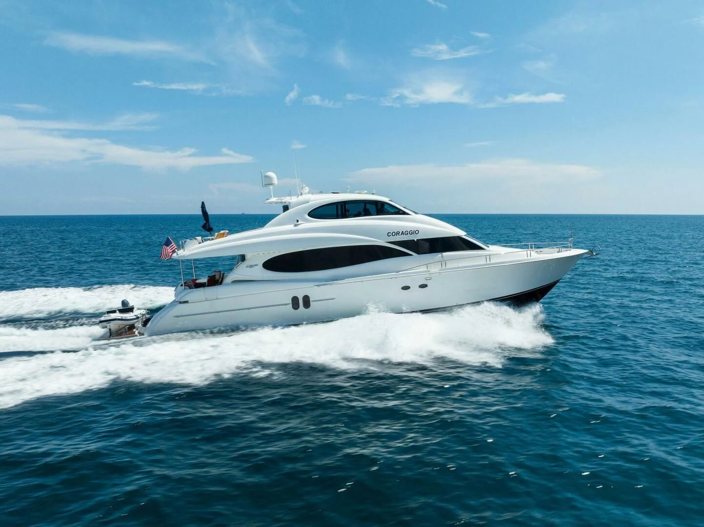 a white yacht on the water aboard CORAGGIO Yacht for Sale