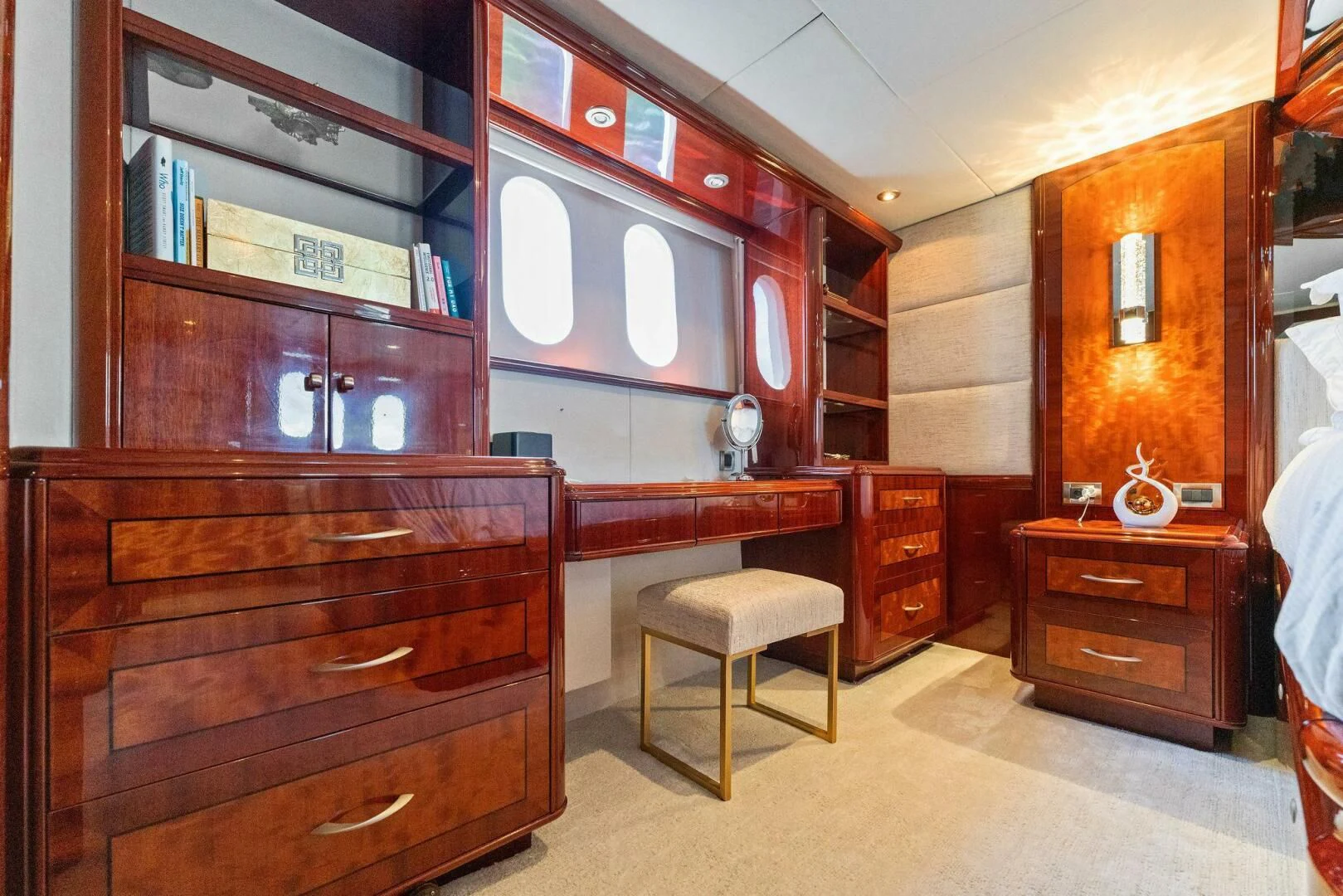 a room with a cabinet and a mirror aboard CORAGGIO Yacht for Sale