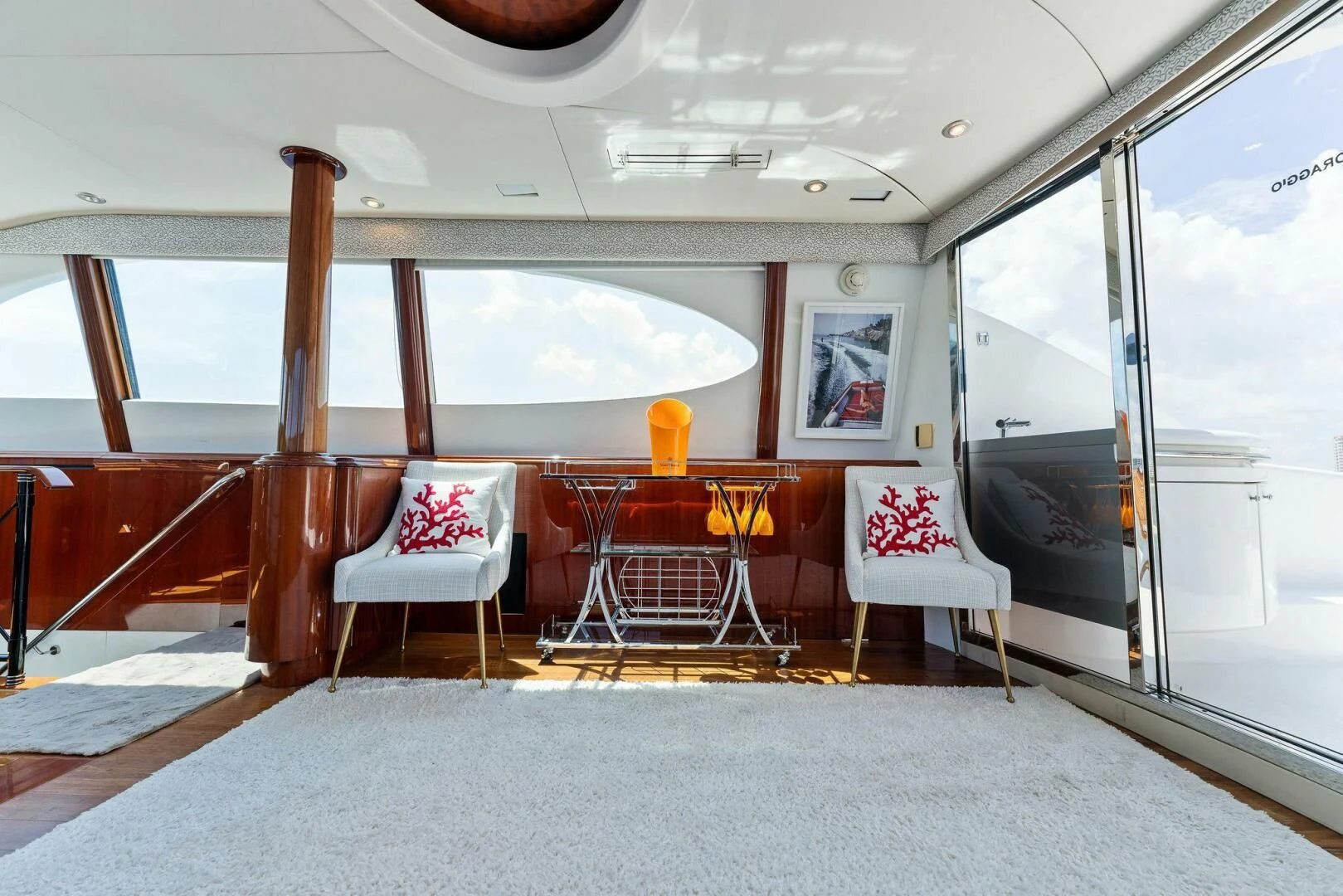 a room with chairs and tables aboard CORAGGIO Yacht for Sale