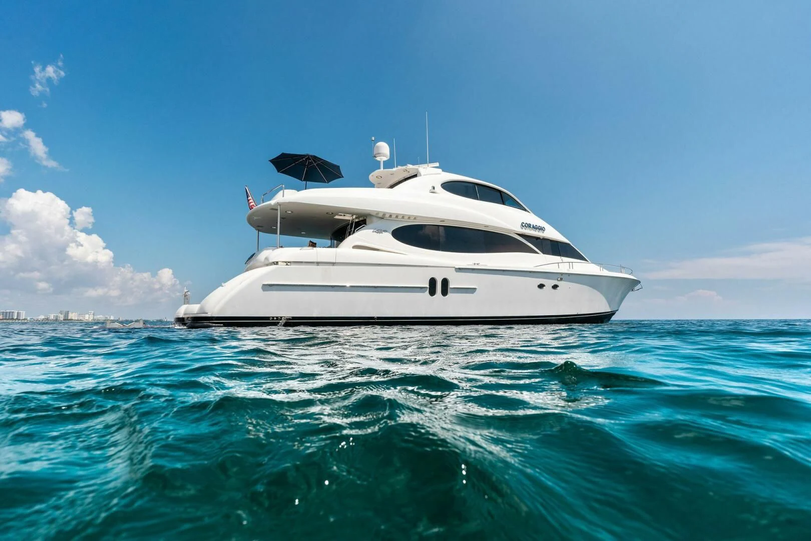 a white yacht in the water aboard CORAGGIO Yacht for Sale