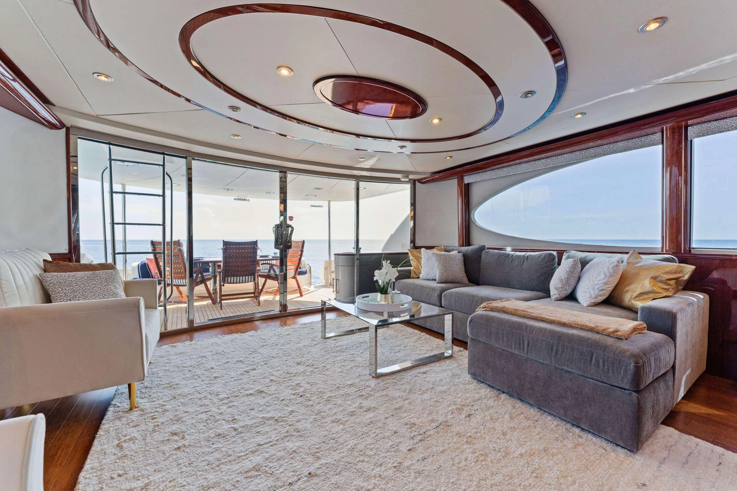 a living room with a large glass ceiling aboard CORAGGIO Yacht for Sale
