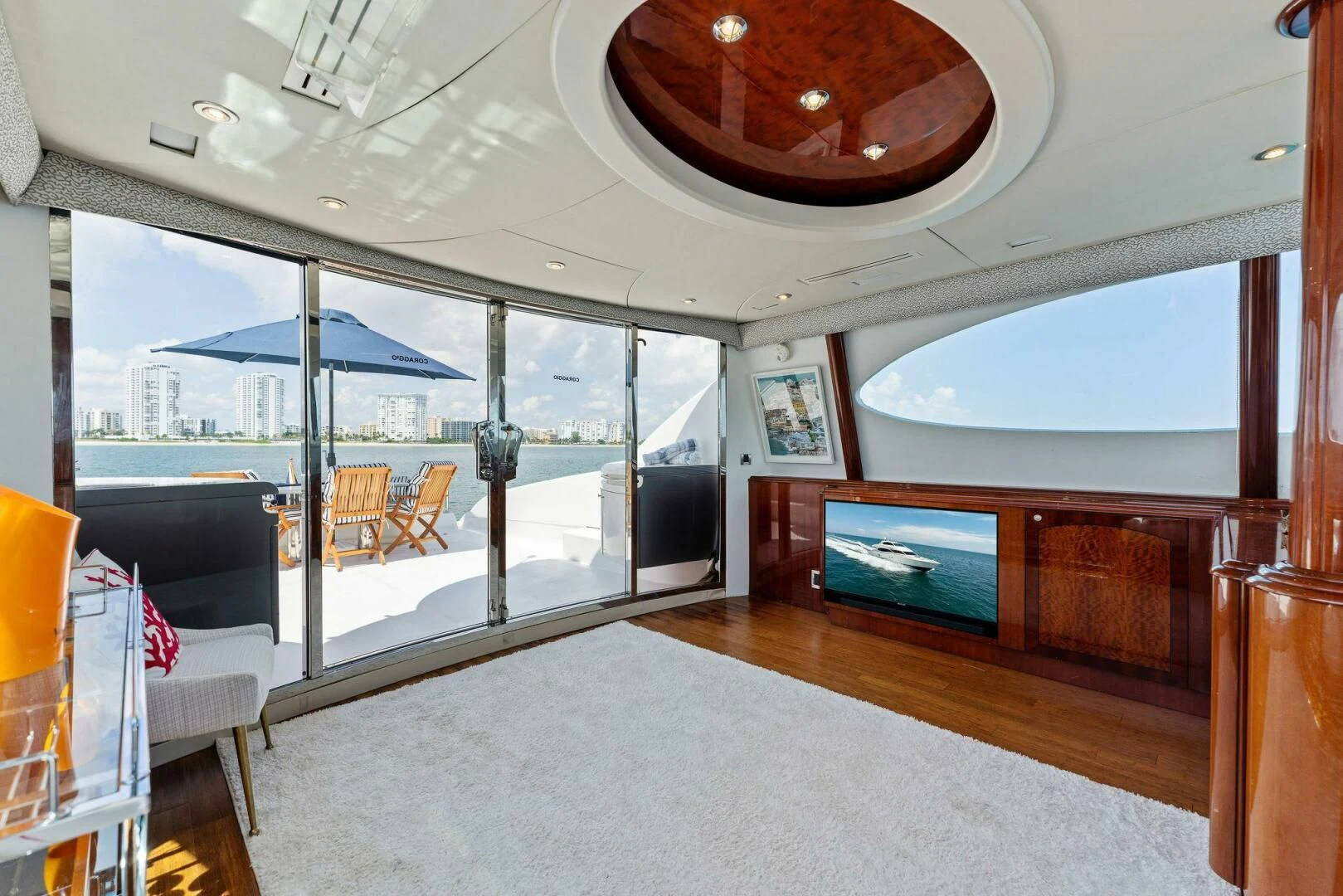 a room with a large glass window aboard CORAGGIO Yacht for Sale
