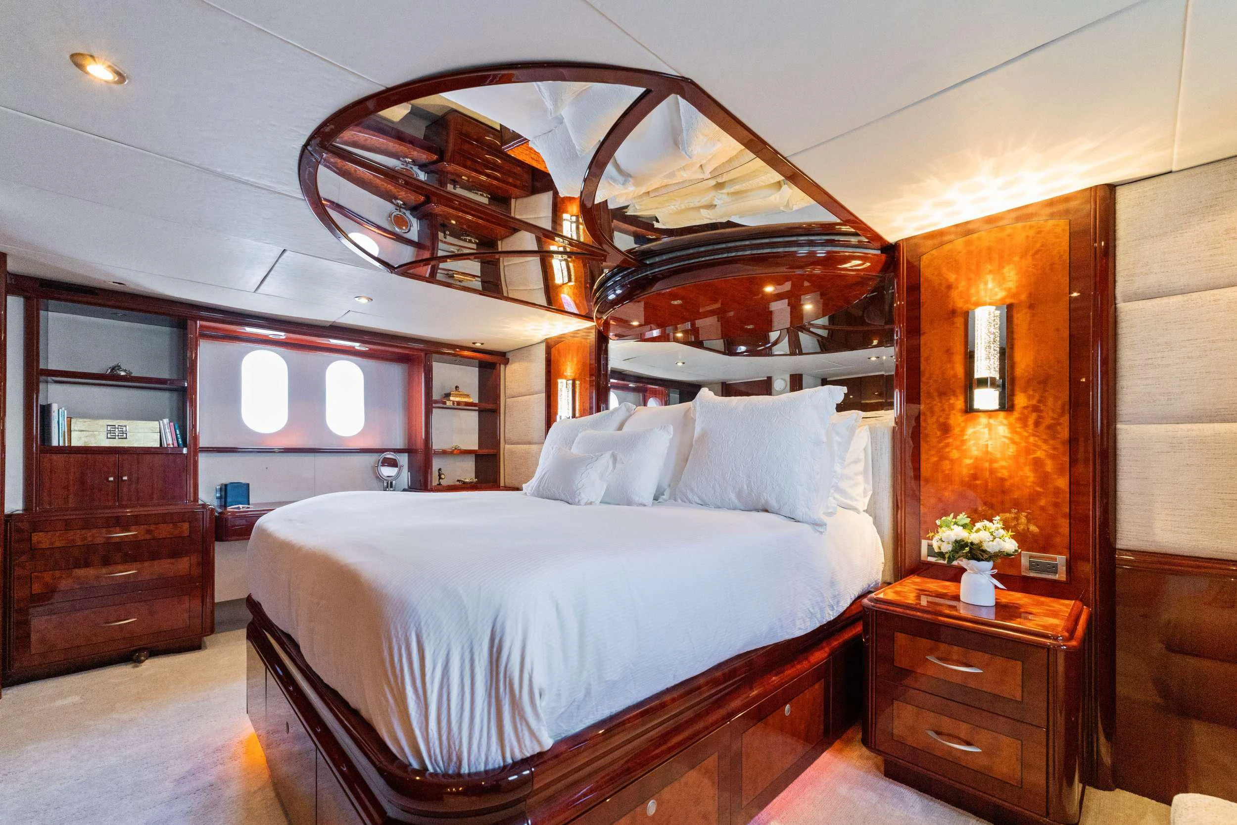 a bed with a white sheet aboard CORAGGIO Yacht for Sale