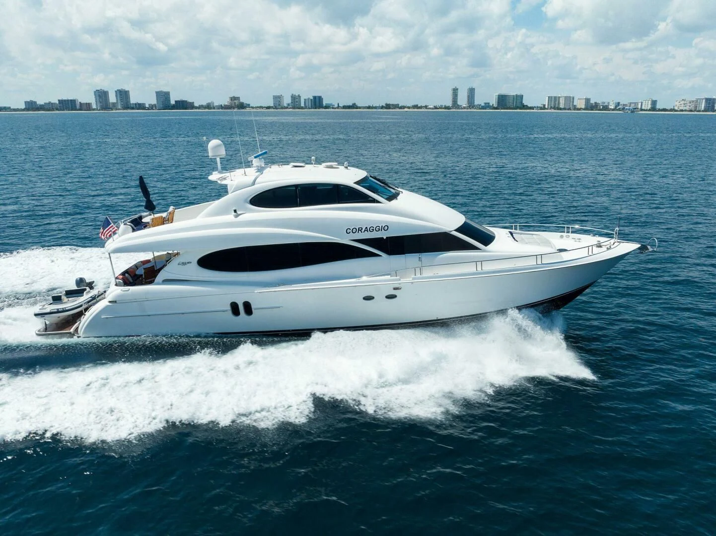 a white yacht on water aboard CORAGGIO Yacht for Sale