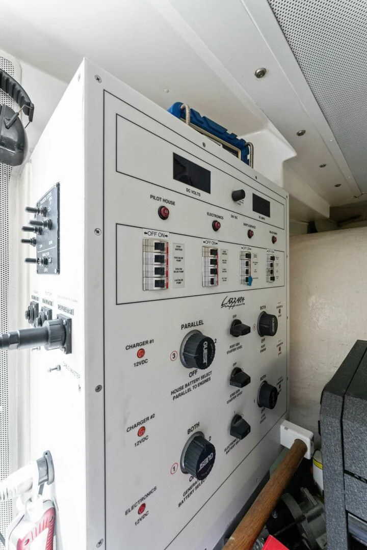 a white electrical device with black buttons aboard CORAGGIO Yacht for Sale