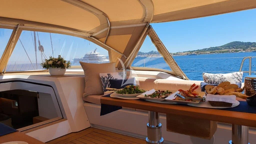 a table with food on it aboard KIWAYU Yacht for Charter