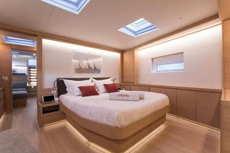 a bed in a room aboard KIWAYU Yacht for Charter