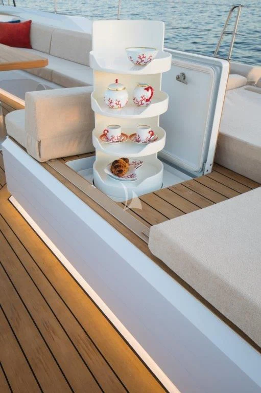 a table with a tray of food aboard KIWAYU Yacht for Charter