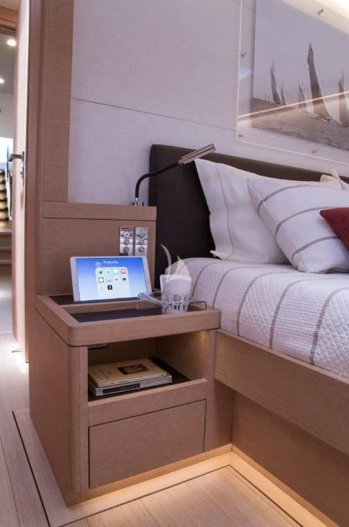 a laptop on a table aboard KIWAYU Yacht for Charter