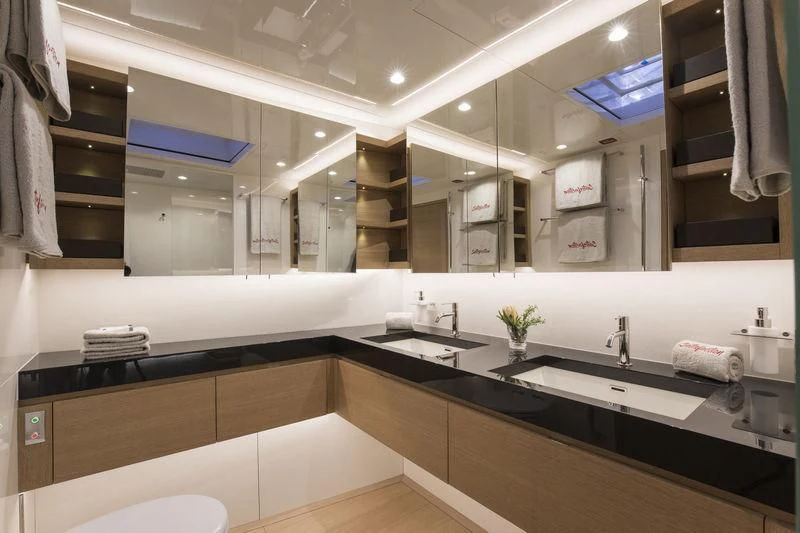 a bathroom with a large countertop aboard KIWAYU Yacht for Charter