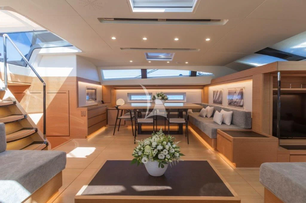 a modern looking living room aboard KIWAYU Yacht for Charter
