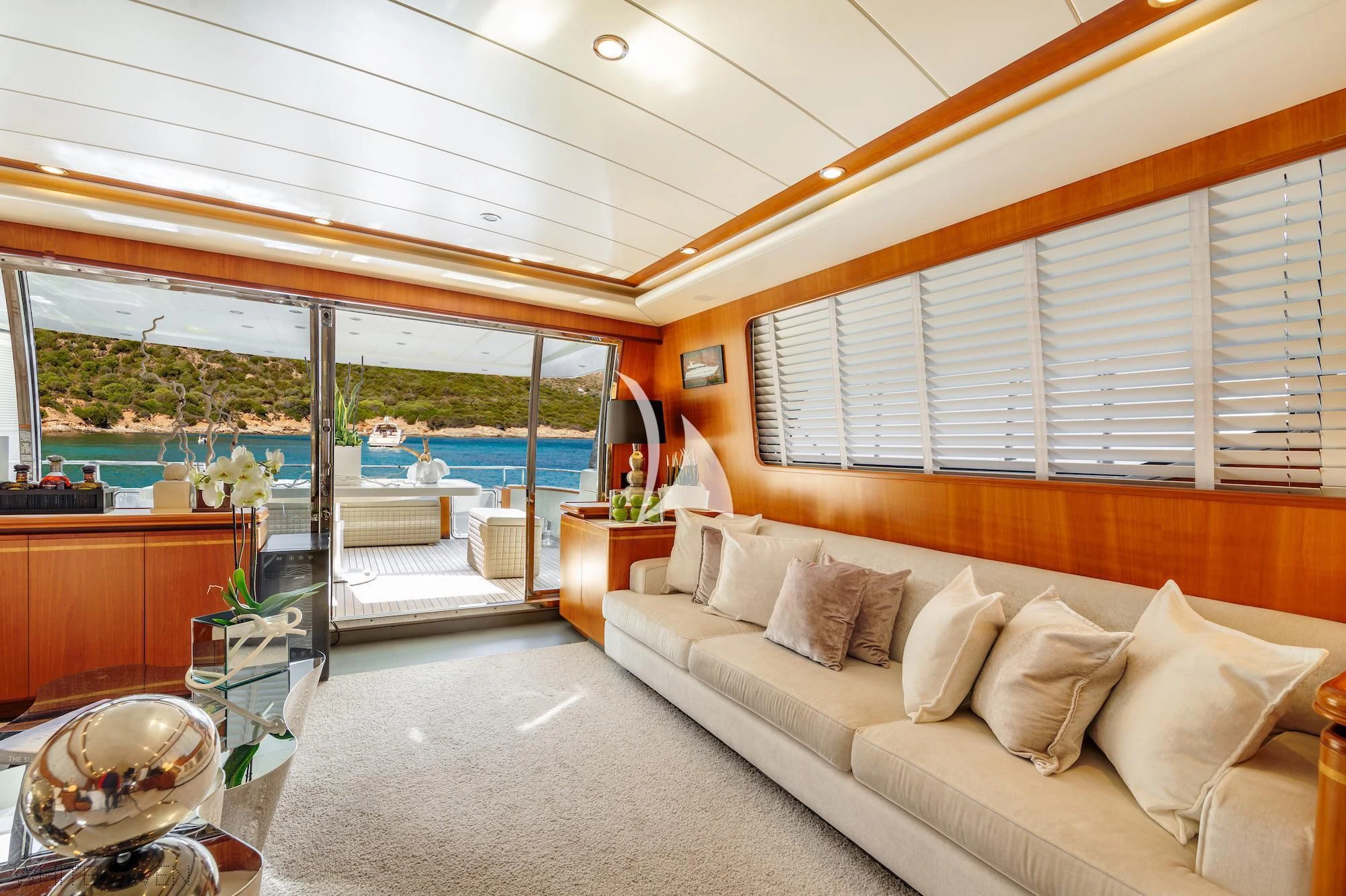 a living room with a large window aboard WHITEHAVEN Yacht for Sale