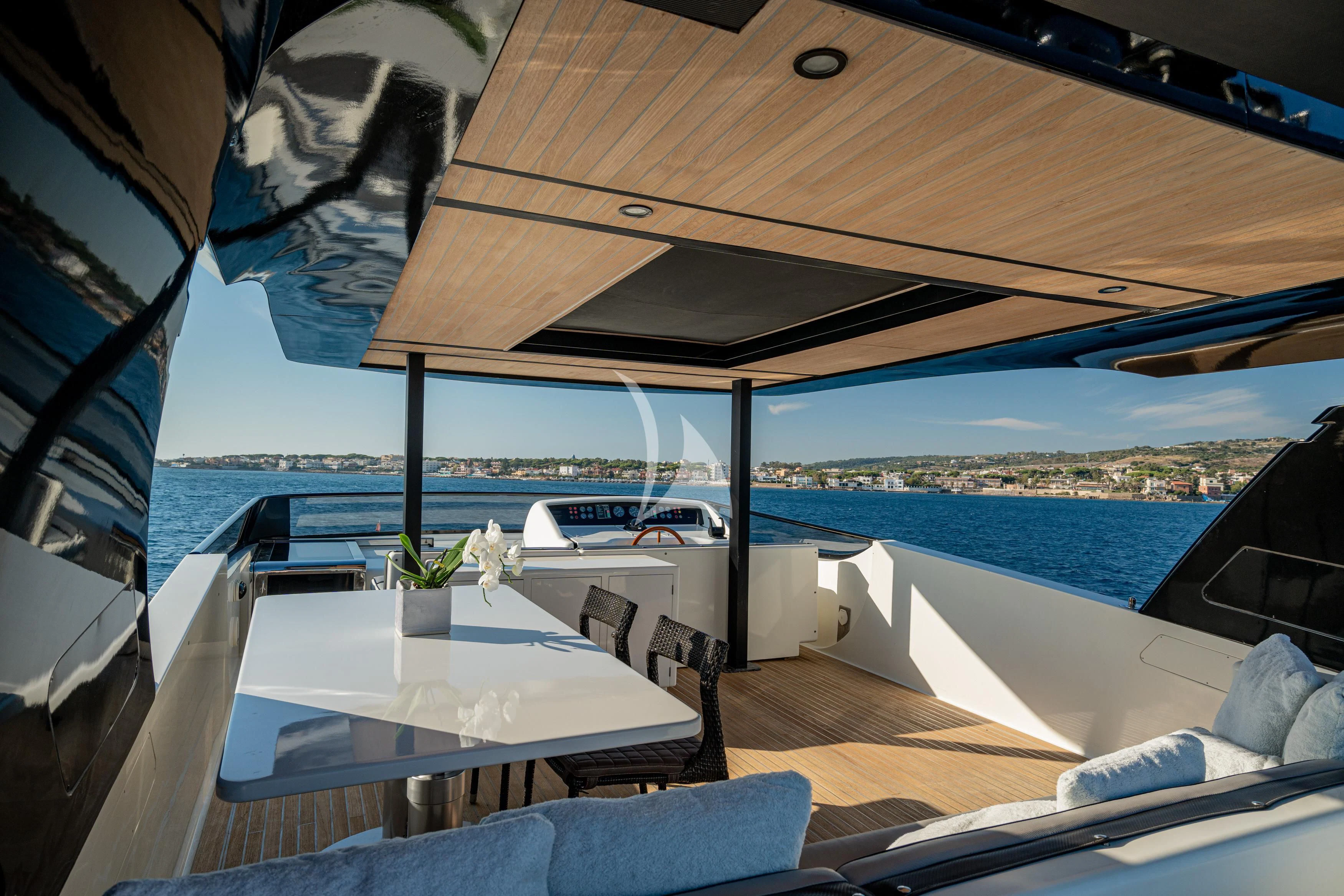 a room with a table and chairs aboard WHITEHAVEN Yacht for Sale